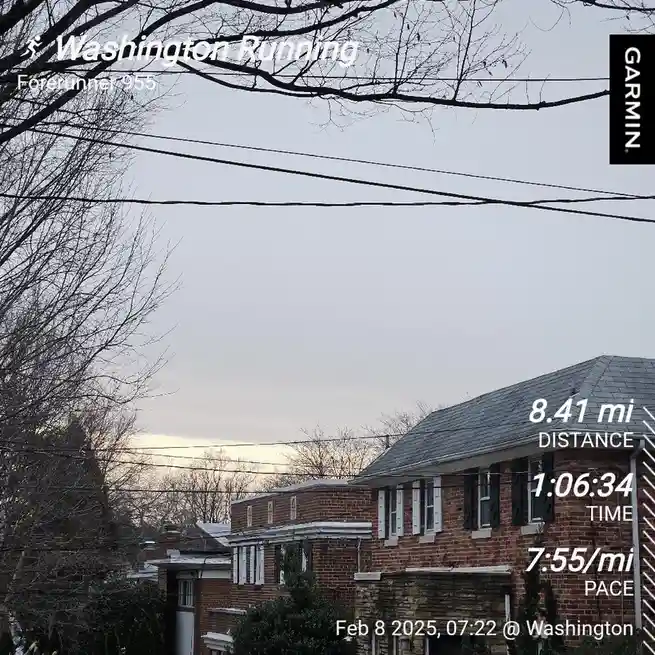 A screenshot from a Garmin Forerunner 955 running watch displays a workout log showing 8.41 miles run in 1 hour 6 minutes 34…