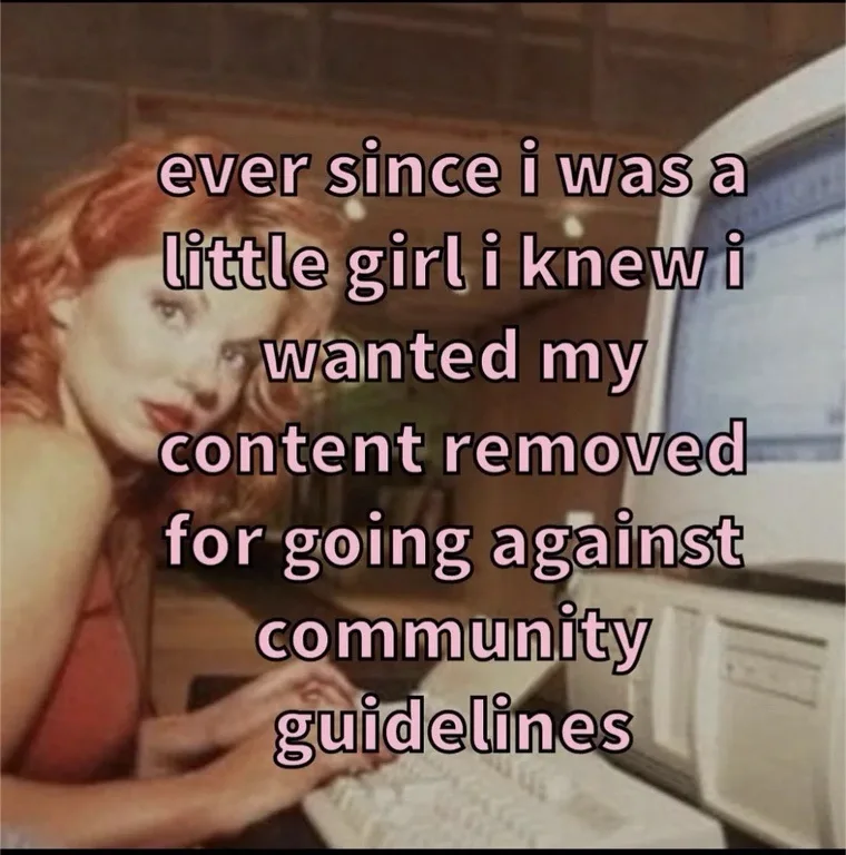 A woman with red hair sits at an old computer, looking directly at the camera with a knowing expression. Overlaid text…
