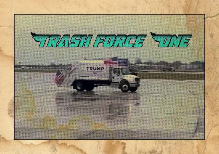 A blurry image of a white garbage truck with 'TRUMP' written on its side and American flags attached, driving on a wet…