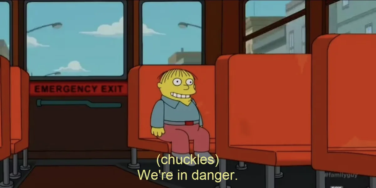 A cartoon boy with yellow skin and a wide grin sits alone on a red bus seat, looking cheerful despite the text overlay…