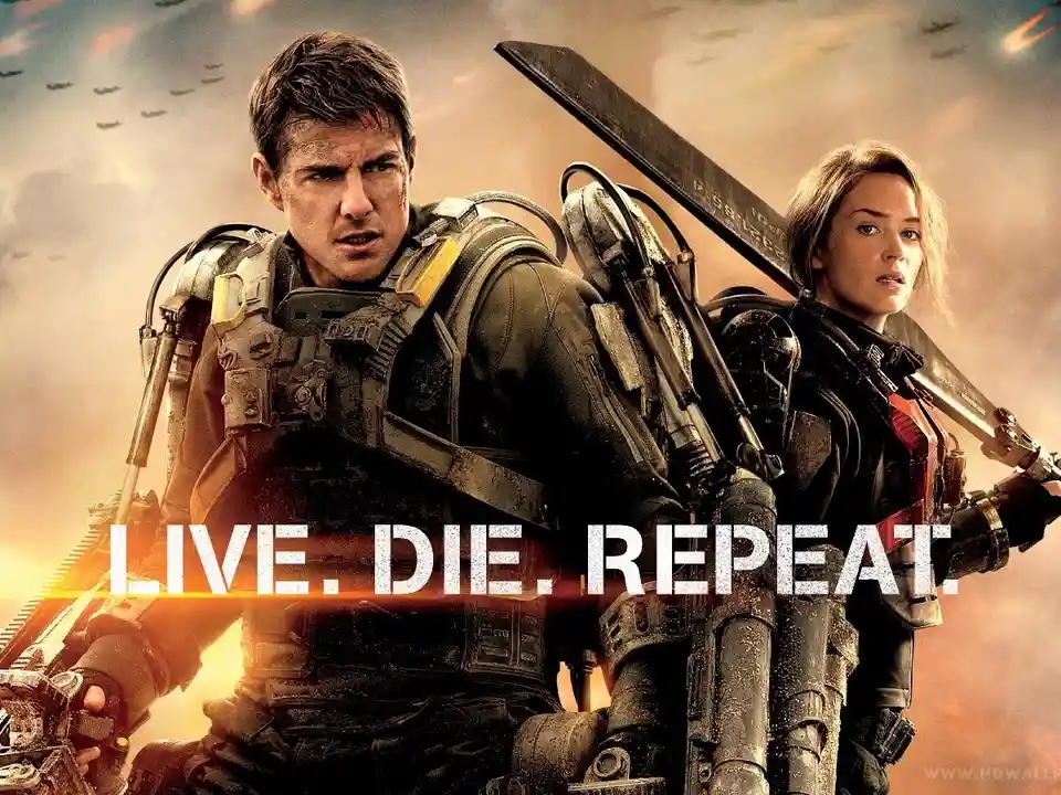 A promotional movie poster featuring actors Tom Cruise and Emily Blunt in futuristic combat gear, holding weapons against a…
