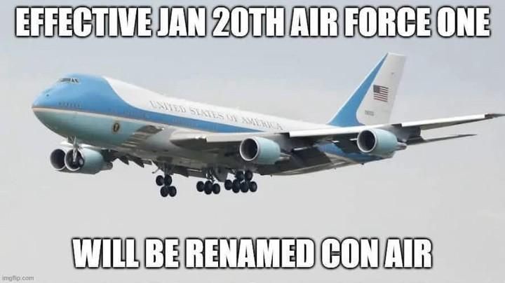 A large white and blue Air Force One aircraft is shown in flight with landing gear down against a gray sky. Bold white text…