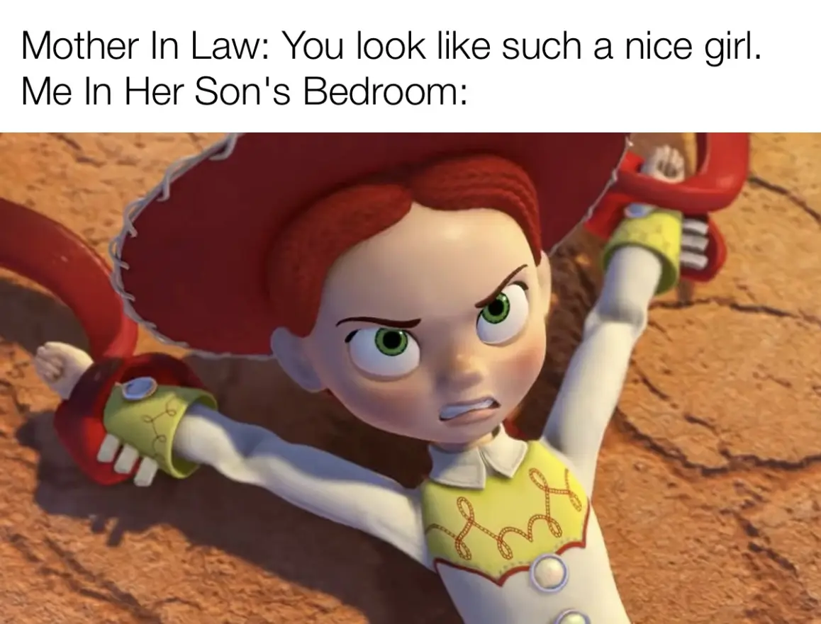 An image of Jessie from Toy Story, a cartoon cowgirl with red hair and a red hat, lying on cracked earth with an angry…
