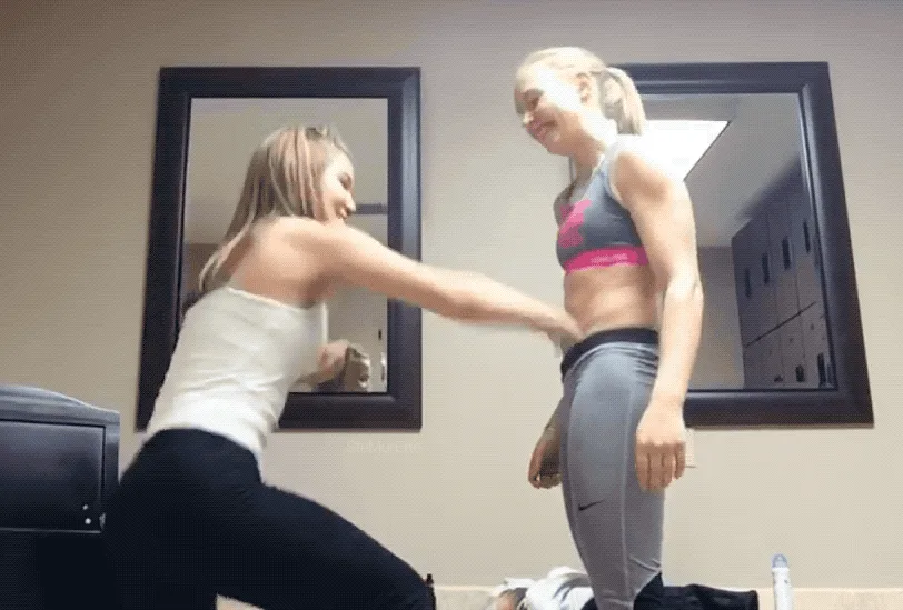 A six-panel image sequence shows a woman in a white tank top kneeling and playfully punching or slapping the abdomen of…