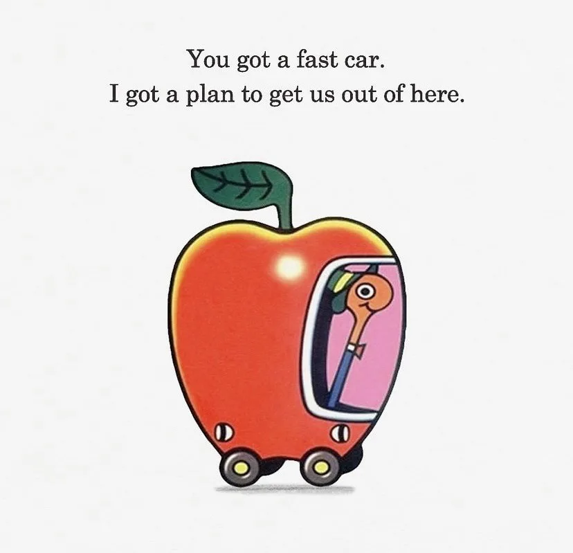 A cartoon apple with wheels and a green leaf on top, modified to look like a car with a pink interior. Inside the apple-car…
