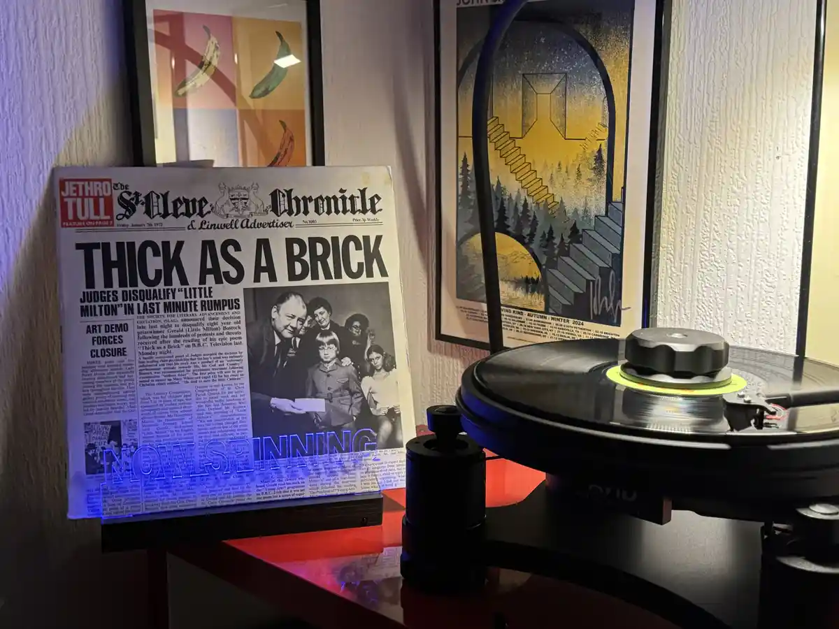 A vintage newspaper titled 'The St. Cleve & Linwell Advertiser' with the headline 'THICK AS A BRICK' and subheadings about a…