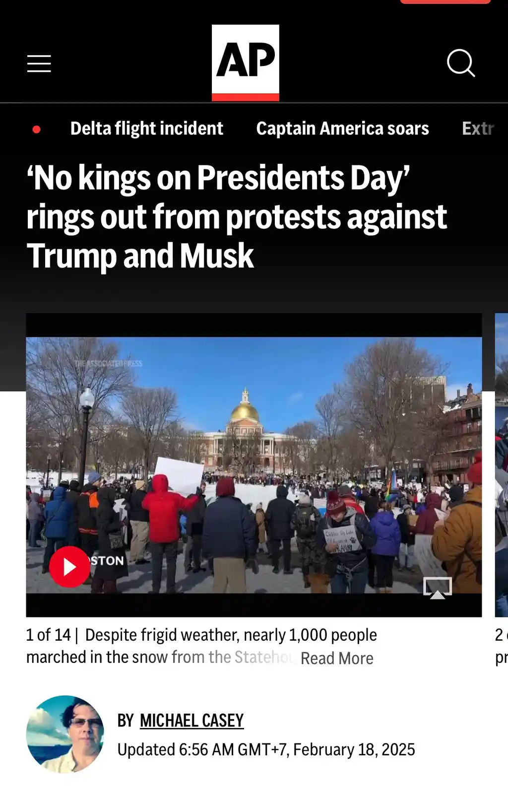 A screenshot of an Associated Press news article showing a protest in snowy weather with a large crowd gathered in front of…