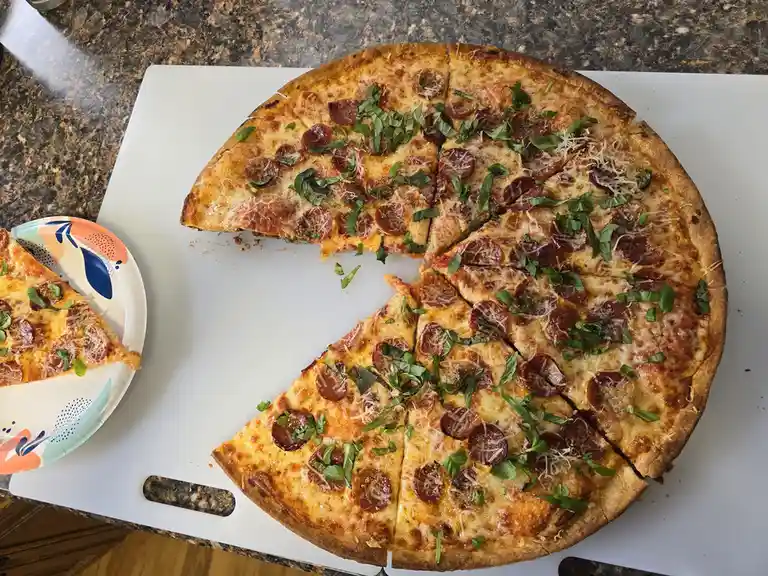 Deliciously thin 16-inch crust pizza delight.