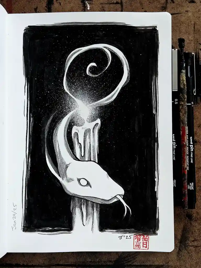 A black-and-white ink drawing in a sketchbook shows a stylized snake with its head shaped like a question mark, set against…