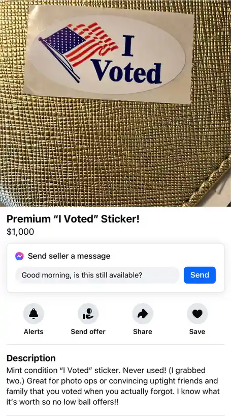 A close-up photo shows a standard oval "I Voted" sticker with an American flag graphic, placed on a textured gold-colored…