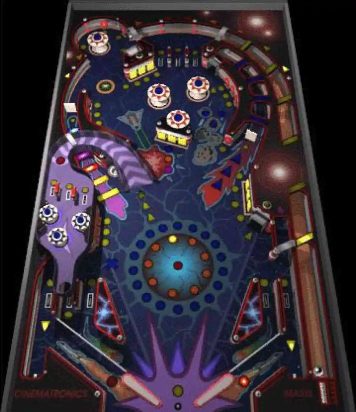 An overhead view of a colorful, lit-up pinball machine playfield with ramps, bumpers, and targets, overlaid with the text…