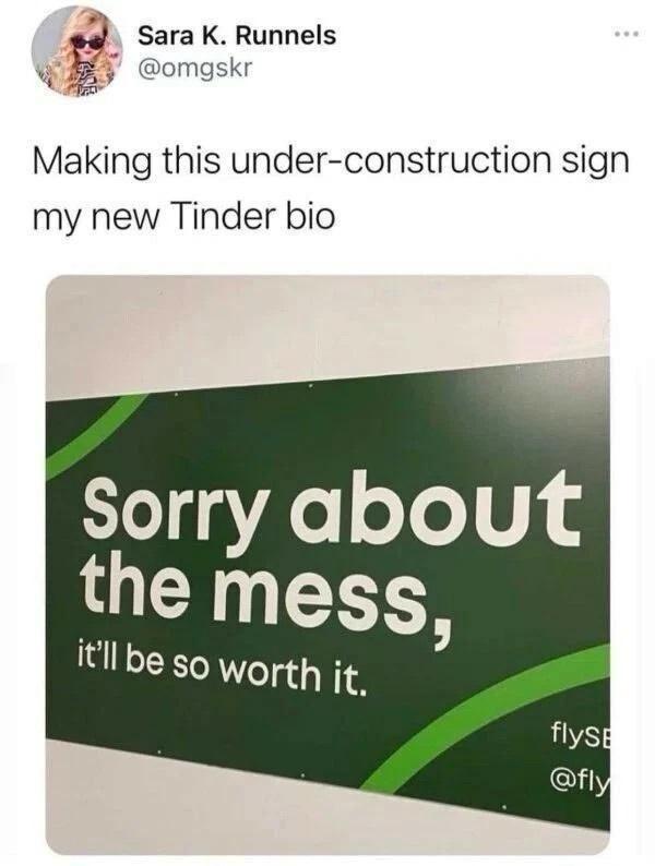 A green under-construction sign with white text reading 'Sorry about the mess, it'll be so worth it.' The sign is posted on…