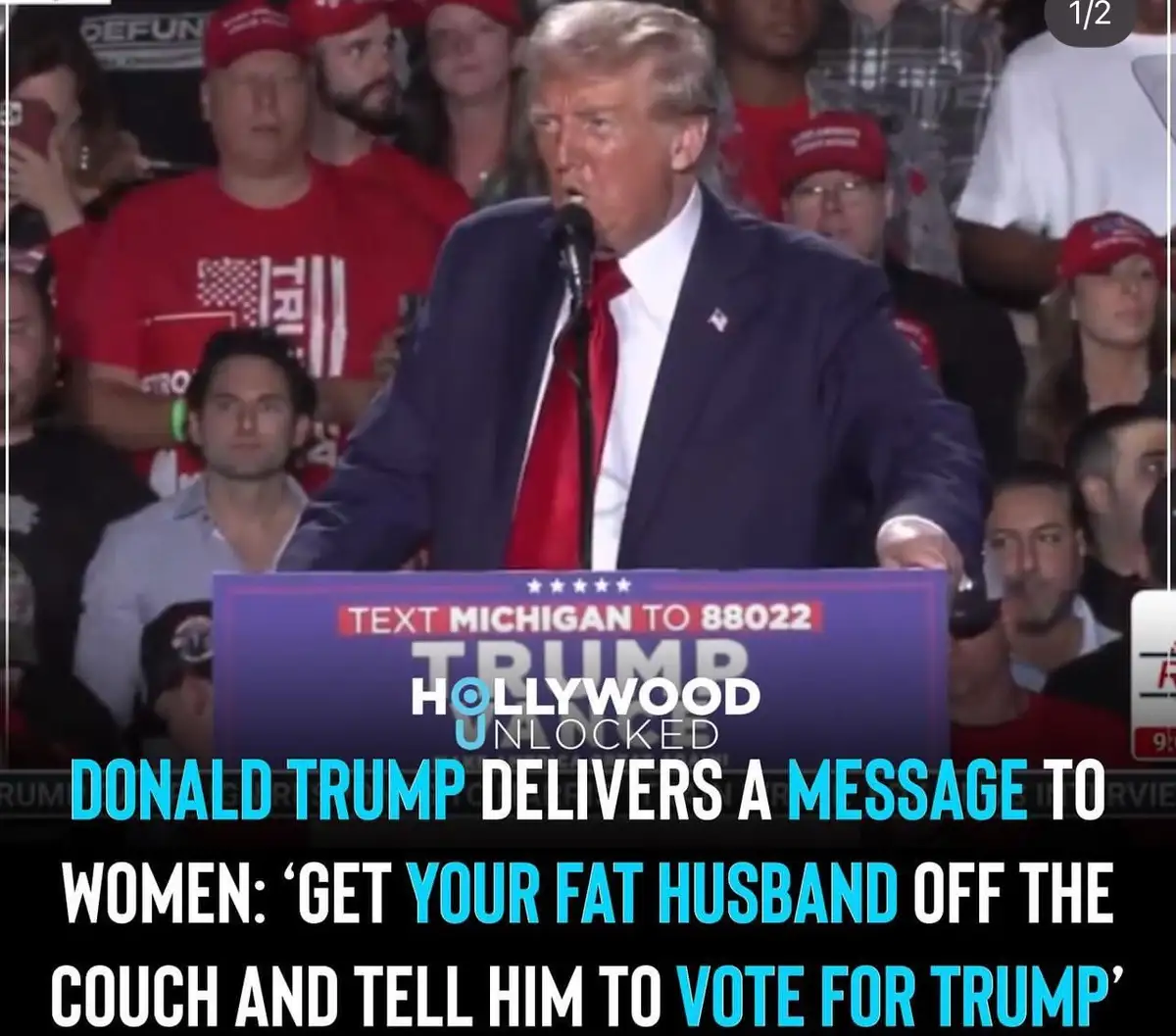 A still image of Donald Trump speaking at a rally, wearing a dark suit and red tie, with a podium that reads 'TEXT MICHIGAN…