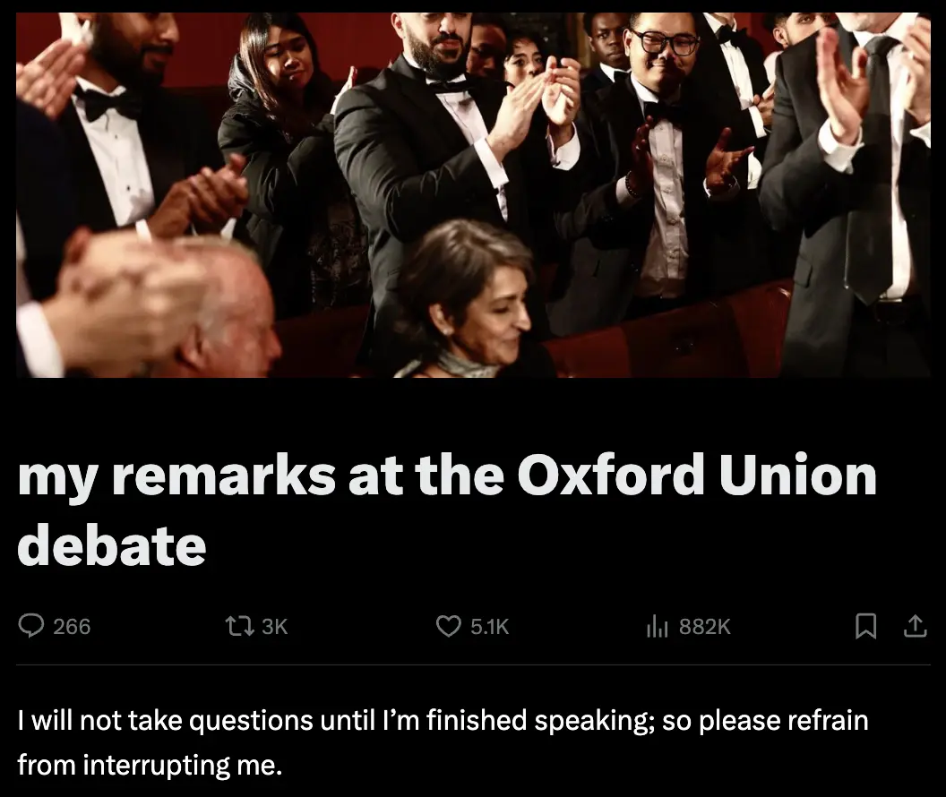 An image of an audience in formal attire clapping at a debate, overlaid with text claiming to be 'my remarks at the Oxford…