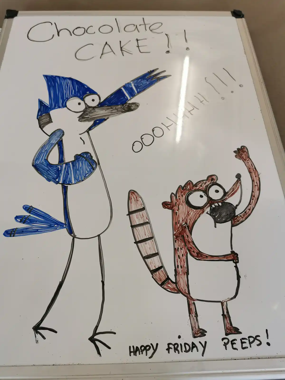 A hand-drawn image on a whiteboard shows two cartoon characters: a blue jay with a surprised expression and a red fox-like…