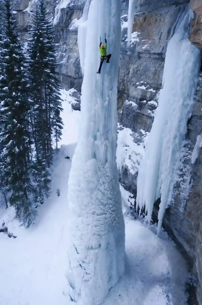 Scaling a frozen waterfall: impressive but absolutely terrifying!