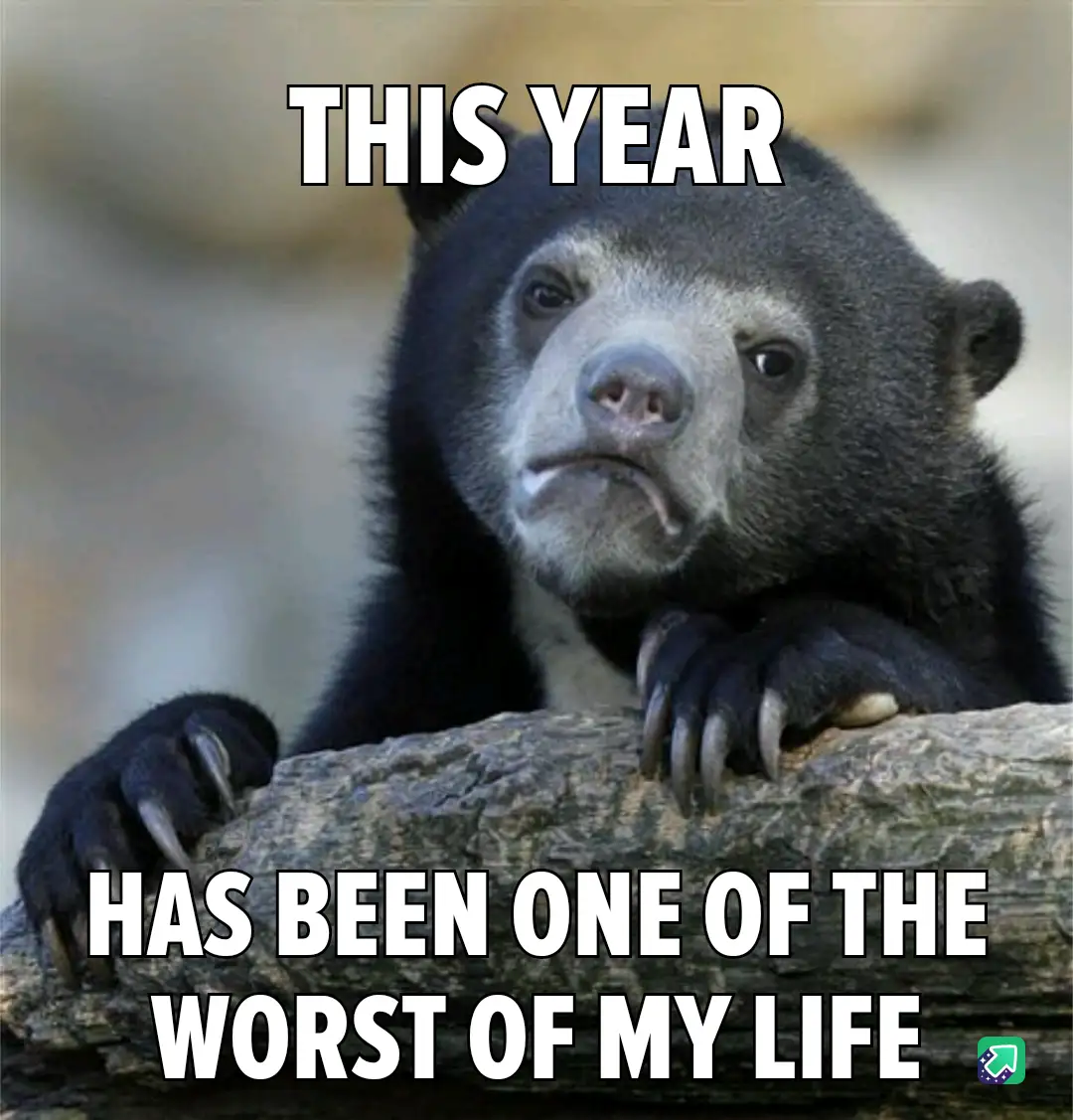 A close-up photo of a sad-looking spectacled bear resting its paws on a log, with white bold text overlaid that reads 'THIS…