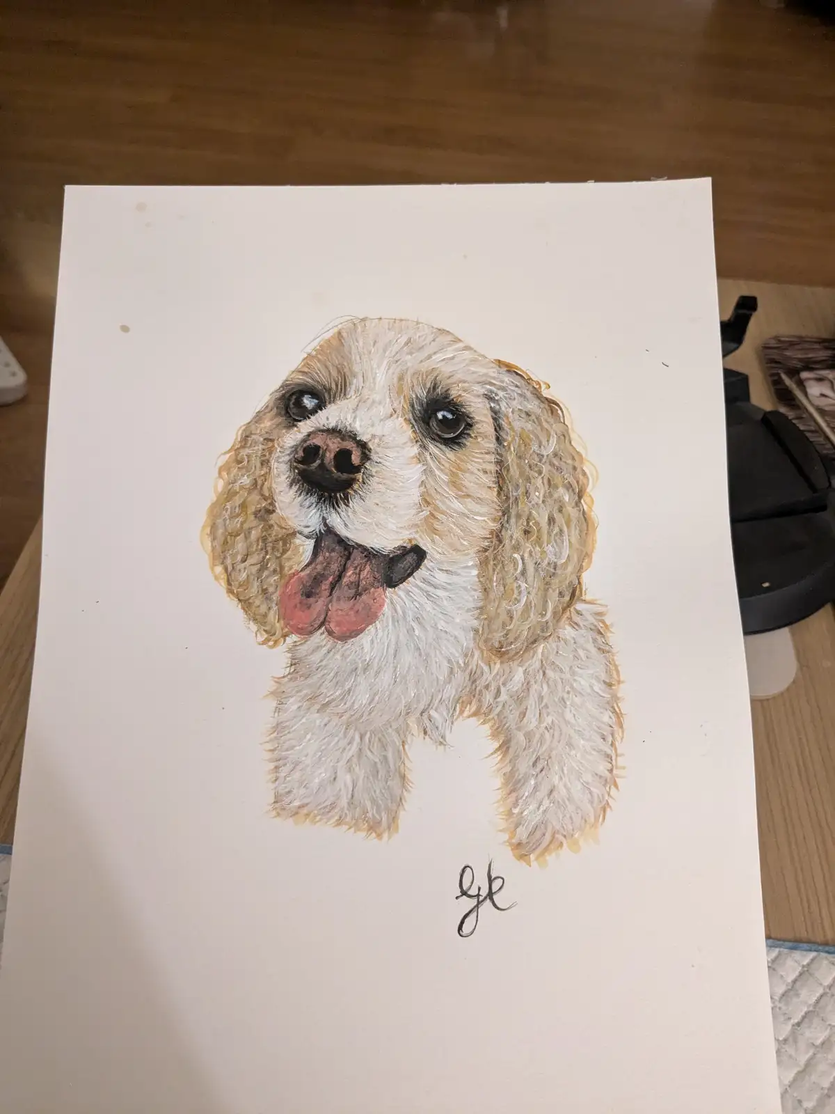A watercolor painting of a fluffy, light-colored dog with floppy ears and a pink tongue sticking out, sitting on a white…