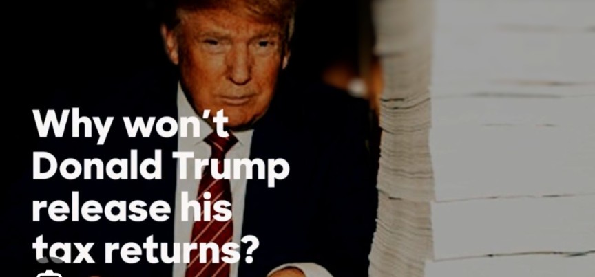 A photo of Donald Trump in a suit and tie, looking serious, with a large stack of papers visible to his right. White text…