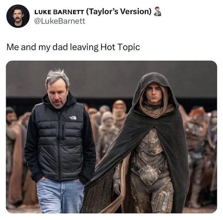 A social media post by Luke Barnett (Taylor’s Version) shows a photo of two men walking away. The man on the left wears a…