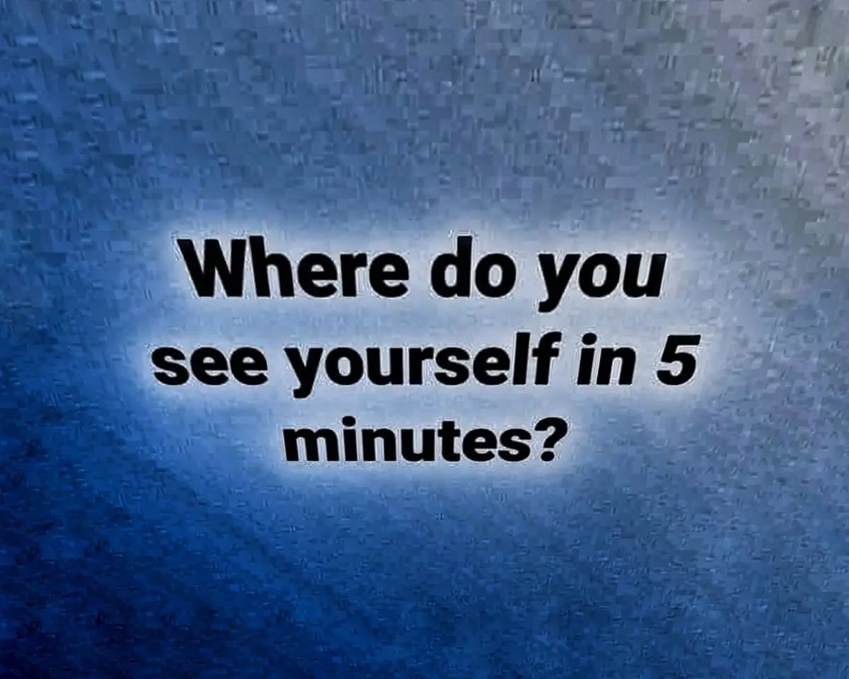 The image displays bold black text centered on a blue, pixelated, static-filled background resembling old television noise…