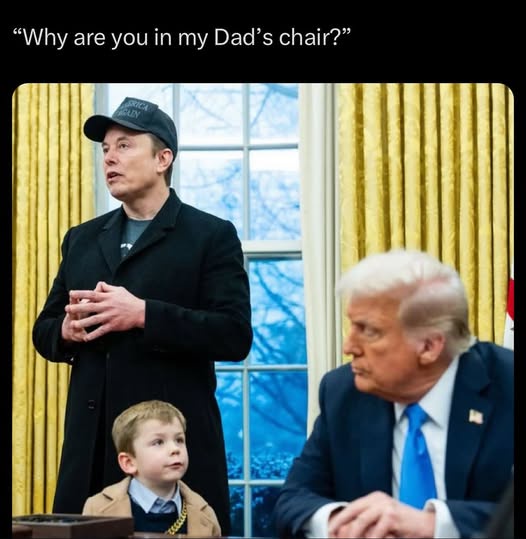 A young boy in a tan jacket and blue shirt looks up at a man in a black coat and cap standing beside him, while Donald Trump…