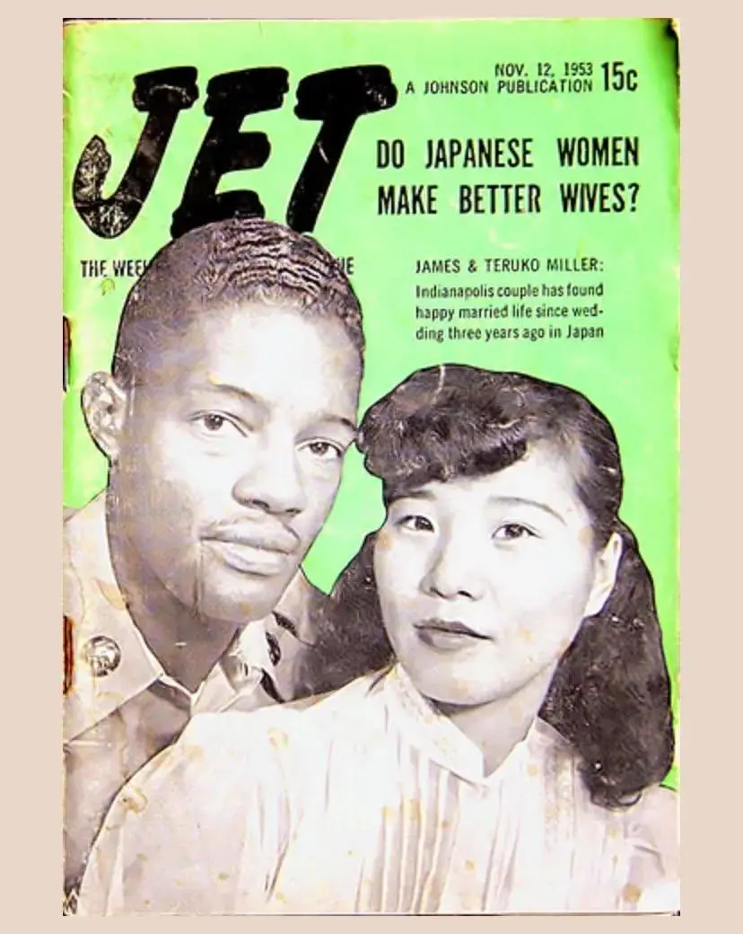 The image is a vintage cover of Jet magazine from November 12, 1953, featuring a Black man and a Japanese woman posing…