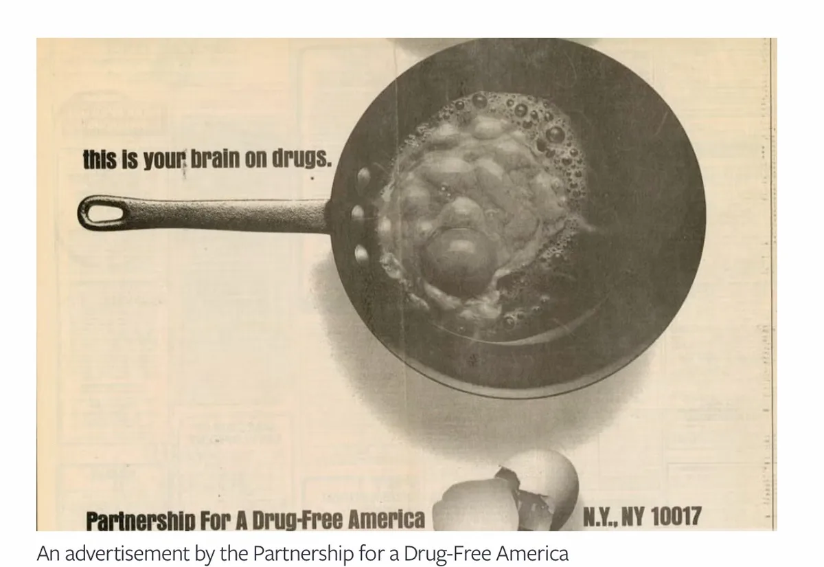 A black-and-white newspaper advertisement shows a frying pan with a raw egg frying in it, with the text 'this is your brain…
