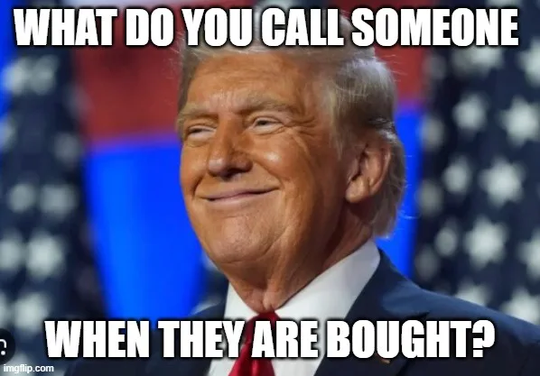 A close-up photo of Donald Trump smiling smugly, wearing a suit and red tie, with blurred American flags in the background…