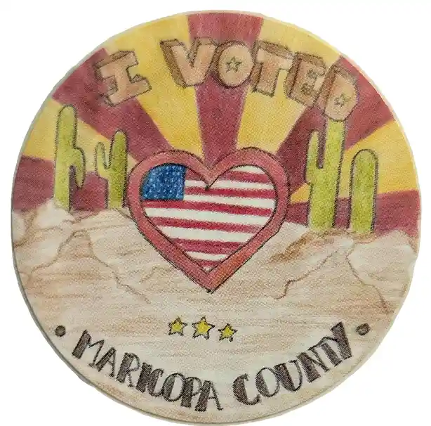 A hand-drawn, circular 'I VOTED' sticker features a heart-shaped American flag in the center, flanked by green cacti on a…