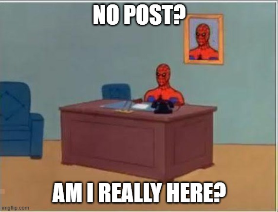 A cartoon Spider-Man sits at a wooden desk in an office, looking confused. Behind him, a framed picture of his own face…