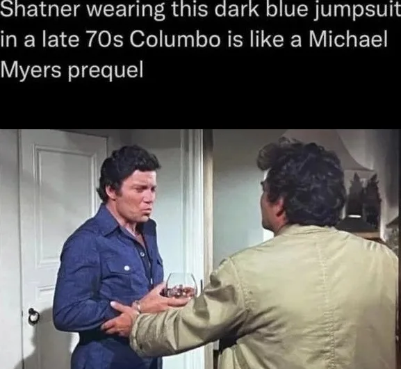 A still from a late 1970s episode of Columbo shows William Shatner in a dark blue jumpsuit, looking sternly at another man…