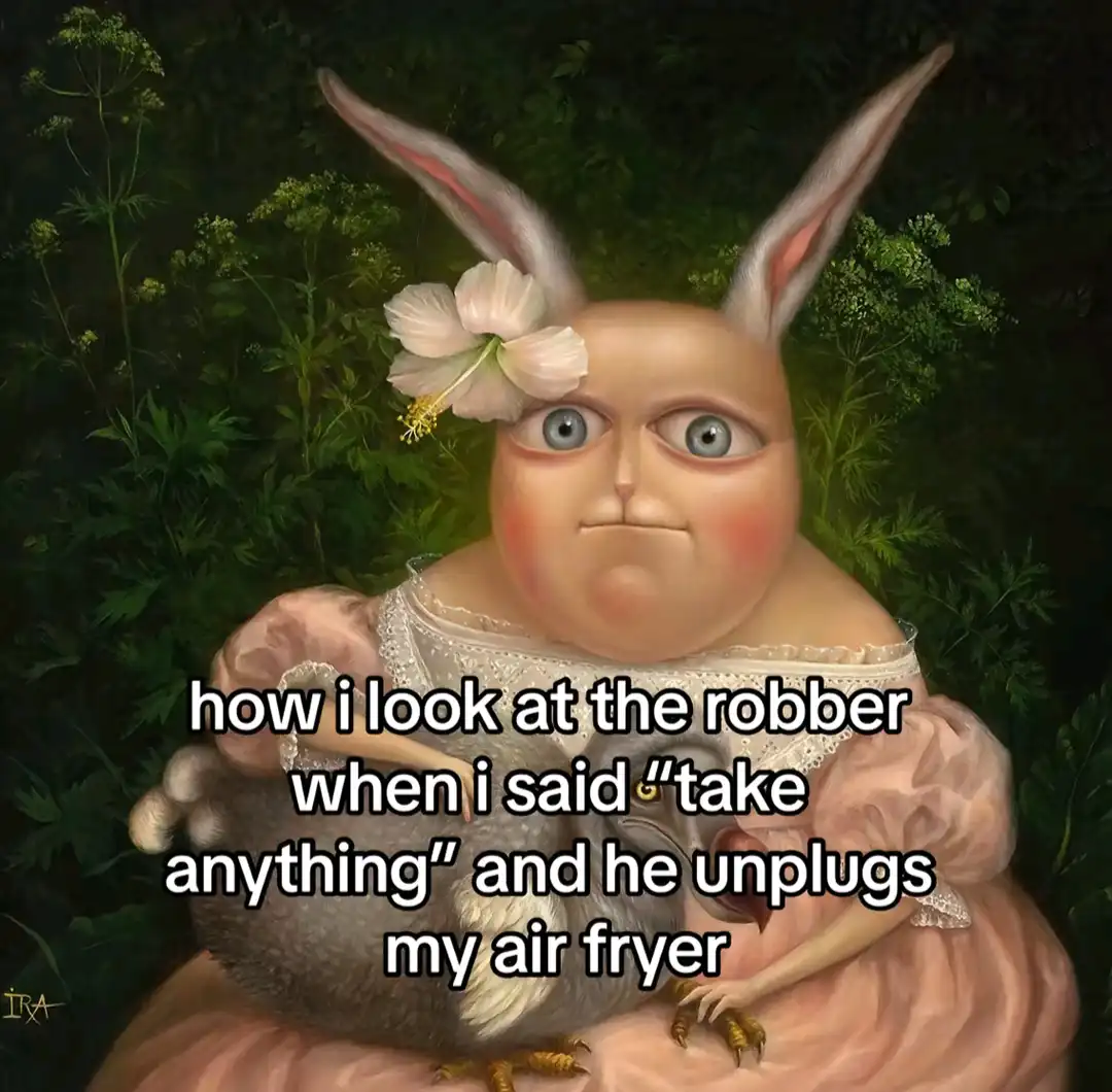 A digitally altered painting of a humanoid rabbit with large blue eyes, rosy cheeks, and a white flower in its hair, wearing…