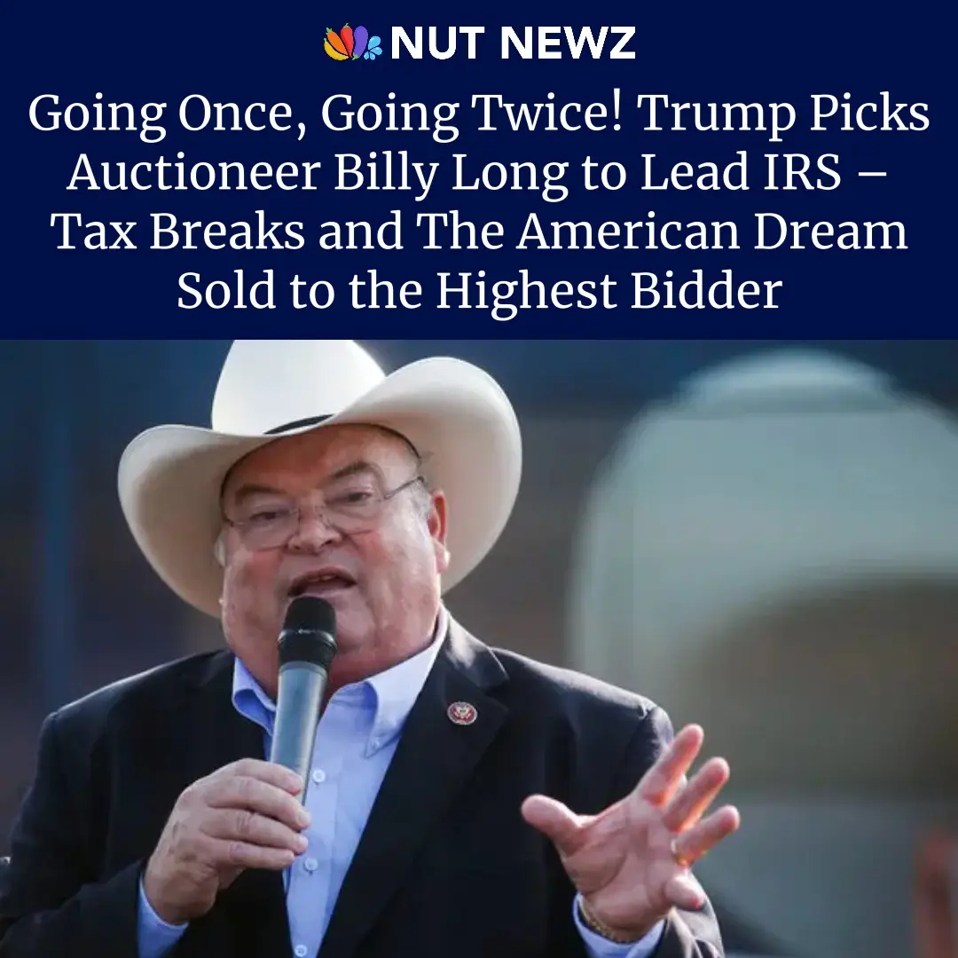 A man wearing a white cowboy hat, glasses, and a dark suit with a light blue shirt speaks into a microphone while gesturing…
