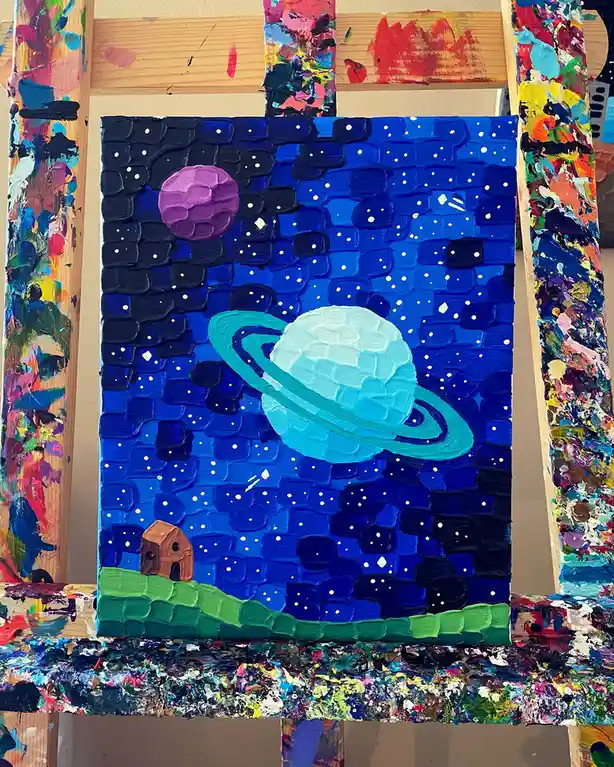 A textured, thickly painted canvas depicts a small brown house on a green hill under a starry blue sky with a large blue…
