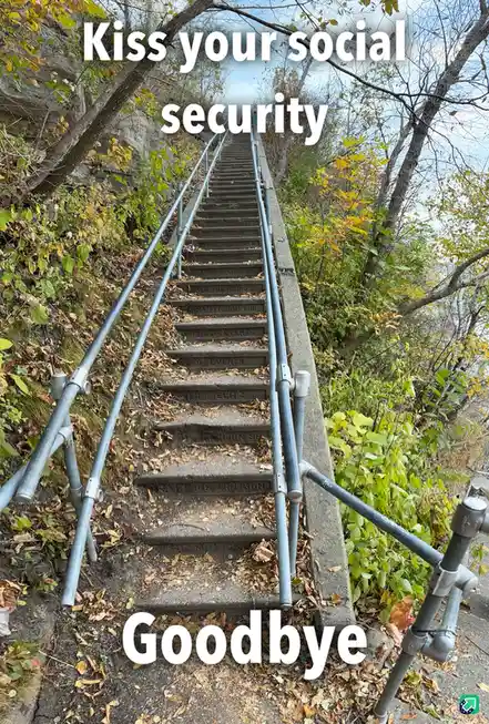 A steep outdoor staircase with metal railings, surrounded by autumn foliage and trees, has names engraved on each step…