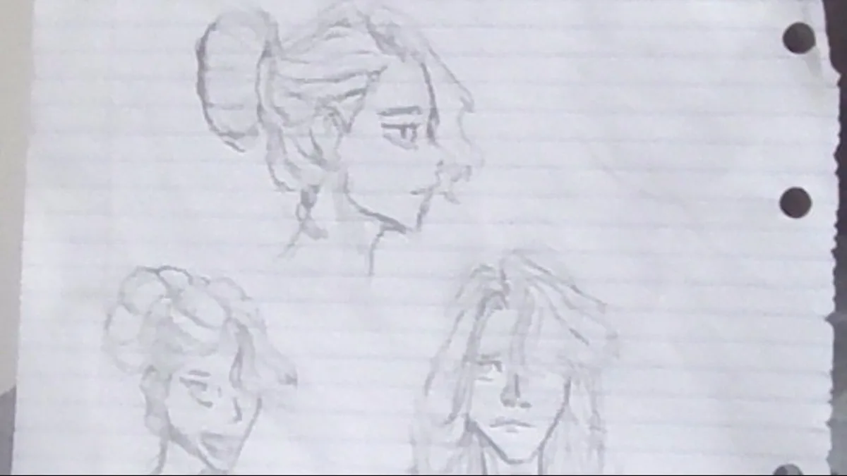 A hand-drawn pencil sketch on lined notebook paper shows three distinct character portraits. The top portrait is a side…