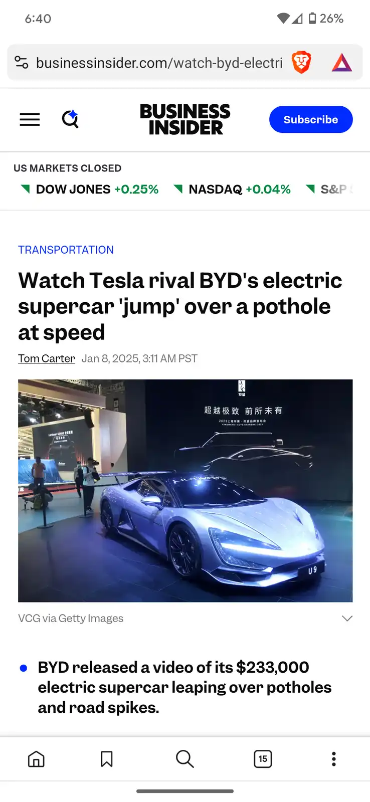 A screenshot of a Business Insider article about BYD's electric supercar, featuring a silver sports car on display at an…