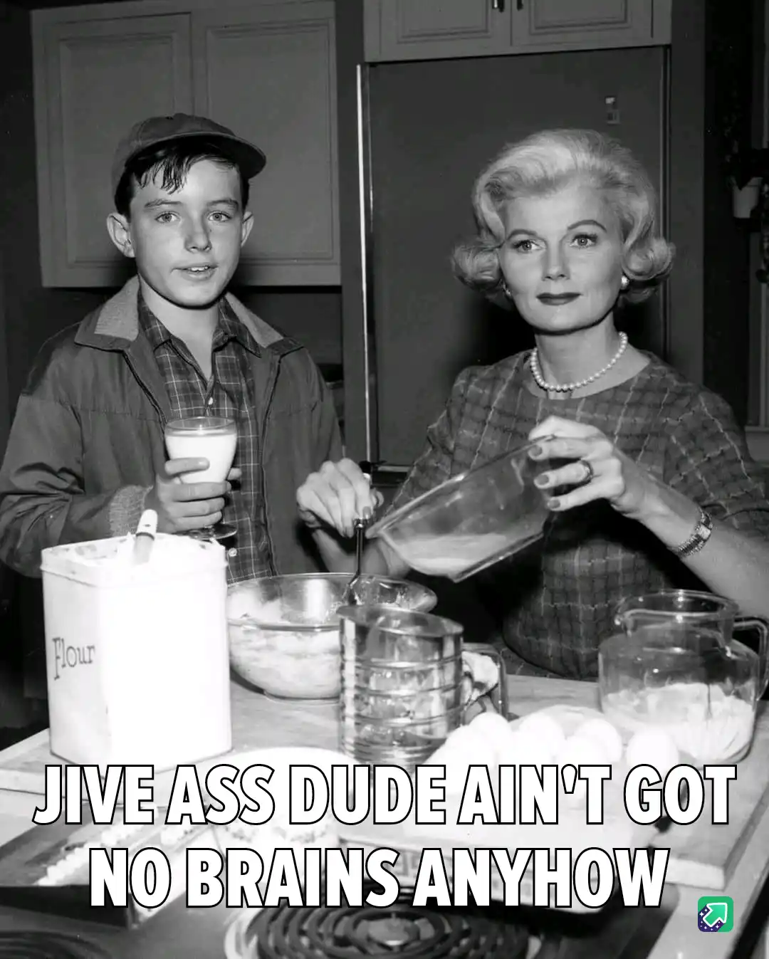 A black-and-white photo shows a young boy in a cap holding a glass of milk while standing beside a woman in a 1950s-style…