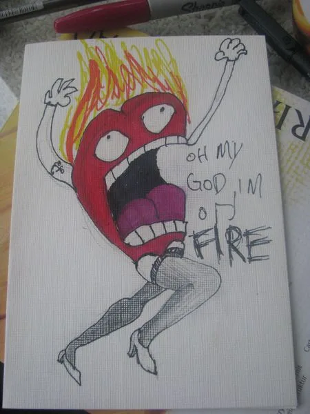 A hand-drawn cartoon character with a red face, wide eyes, and arms raised in panic, with yellow and orange flames drawn…