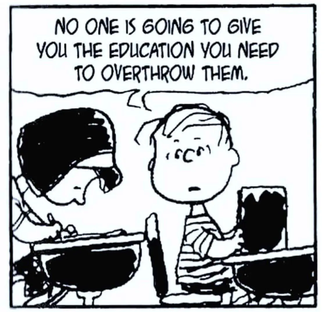 A black-and-white Peanuts comic strip panel shows Lucy van Pelt at a desk writing while Charlie Brown stands beside her…