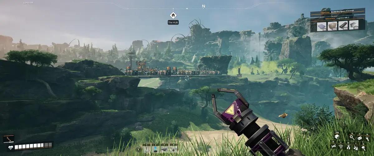 A screenshot from the game 'Starfield' shows a player's view of a lush, rocky alien landscape with a large industrial base…